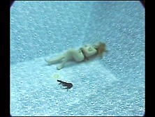 Maggie nude underwater