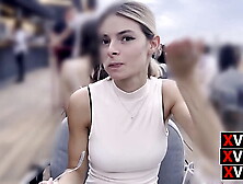 Around Bucharest,  skank picked up in TAXI and taken to DINNER.  Dialogues in ita.  Outdoors.