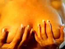 Girl gropes her big tits