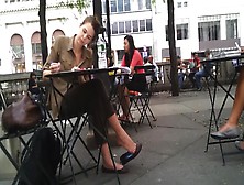 Tall mature woman caught dangling her ballerina shoes in public