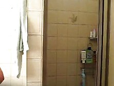 Busty dark brown hair takes hot shower
