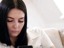 Simon Kitty and Adrianna on a grey coloured sofa in a lesbian scene together