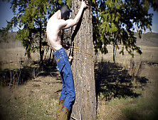 Horny Twink In A Dark Mask Fucks A Sex Toy That Is Strapped To A Tree In A Public Wilderness.  3 Min