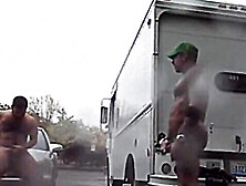 Public Rainy Stroking In A Parking Lot By Two Horny Men