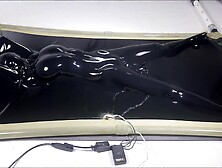 latex vacbed orgasm with vibrator and e-stim