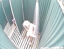 Golden-Haired Woman Is Taking A Shower In Front Of A Hidden Camera Above Her Head