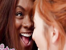 Ebony Girl With Glasses And A Busty Redhead Are Having Interracial Lesbian Lovemaking