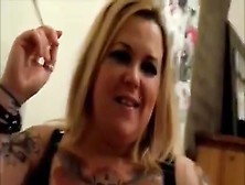 Tattooed Blonde Smokes Cigarette And Sucks Penis