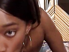 A sexy ebony babe with big tits sucks small white dick
