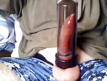 Dick With Condom And Cockring In Vacuum Pump