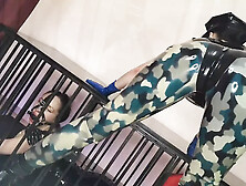Latex Officer Fucks His Latex Prisoner with a Strap-on