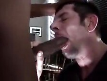 Passionately Sucking A Big Black Cock