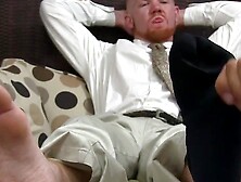 Redheaded Vixen Gives Sensual Footjob with Facial Finish