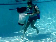 Young Girl Drowning By Scuba Man