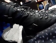 New girl in boots talking to slave & her feet on cock