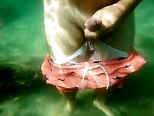 Public Masturbation Of A Beautiful Amateur Couple On A Public Beach Under The Water Sea