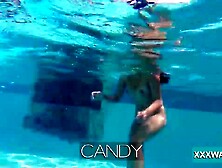 Goddess dark hair hoe Candy swims underwater