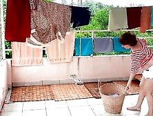 Nude Laundry.  The Maid Is Drying Clothes Inside The Laundry.