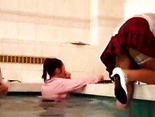 Three Hot Lesbians Playing In A Pool