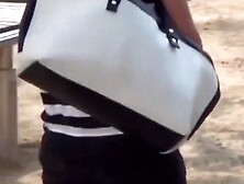 Oriental women filmed as their boobs sway loose under shirts