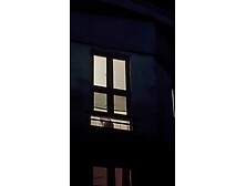Random woman masturbating at window