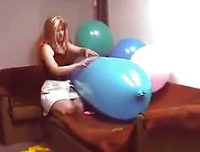 Riding A Blue Zeppelin Shaped Balloon Till Pop