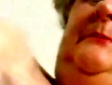 Big-Titted Granny Strips and Plays at Home
