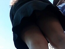 Upskirt - MILF In Black Dress