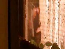 Spying through the window nice blonde big boobs