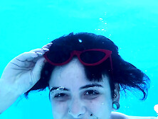 petite teen nude in the swimming pool