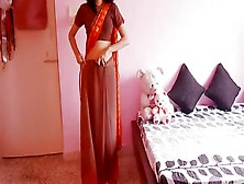 Hot Housewife Wearing Saree And Showing Navel