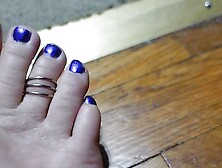 Toe Wiggling with Toe Ring and Purple Toenails
