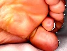 Dark Slut Shows of the Soles of Her Feet