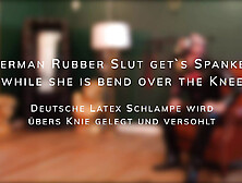 German Rubber Slut Gets Spanked While She Is Bend Over The Knee