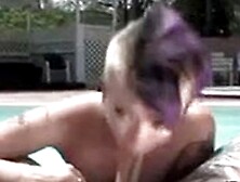 Tattooed Punk Shaved Girl Blowing Near Pool