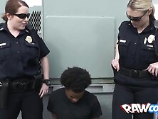 Black cock tasters in cop uniforms make a naughty threesome