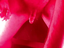 Masturbating With An Overhead View With Nice Red Lights