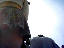 Upskirt -Curly Hair Teen Up Her Little Plaid Skirt
