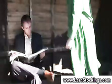 Mature babe in stockings shows off her legs to a guy