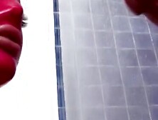 A stunning lesbian dominatrix spanks her submissive cowed infant