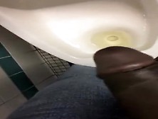 Taking A Piss In The Urinal At The Library