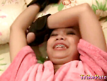 Adorable young Chinese girl in braces gets a face full of cum