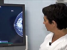 Latinas having a mammogram