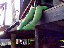 My nylon feet in green tights on your face