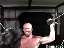 Tortured Handsome Stud Faces BDSM Training in Basement Gym
