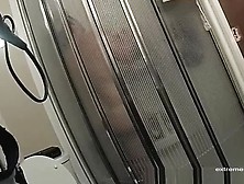 Stepmom from Singapore spied in shower