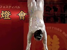 Gorgeous Chinese Girl Performing Death Defying Stunt