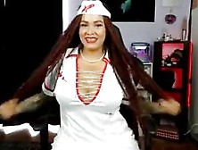 Naughty Shemale In A Nurse Outfit Teases With Her Body