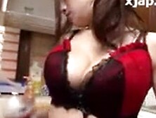 Maid masturbates in kitchen
