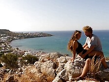 Ravishing Teenie Lovers in Love Passionately Kissing above the Sea on Crete Island